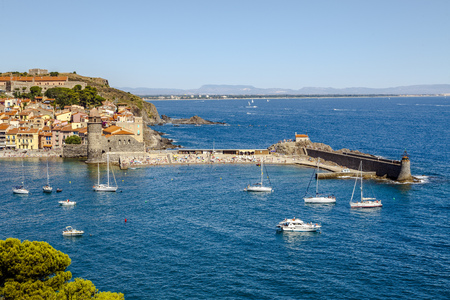 Collioure, France - July 16, 2016: Tourists enjoy the beach of this coastal village in the south of France, Mediterranean sea, Languedoc Roussillon, Pyrenees Orientalesのeditorial素材