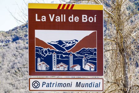 Road sign indicating the entrance to the Vall de Boi, Declared Heritage of humility in 2000 to its 9 Romanesque churchesのeditorial素材