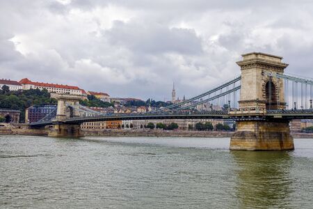 Budapest, Hungary - November 15, 2019: Chain Bridge is a chain bridge that spans the River Danube between Buda and Pest, the western and eastern sides of Budapestのeditorial素材