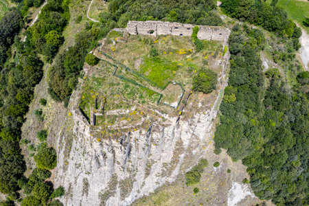 Oris Castle is situated on top of a steep rocky hill about 2km from Oris, a small town in Osona, Catalonia Spain. Aerial view overhead detailのeditorial素材