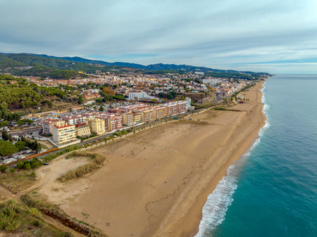 Photo for Aerial panoramic view of Canet de Mar city at dawn. Located in El Maresme, Barcelona, Spain - Royalty Free Image