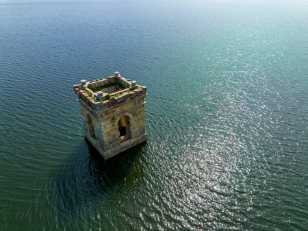 Cuerda del Pozo reservoir on the Duero river view of the bell tower of the church of La Muedra Soria provinceの写真素材