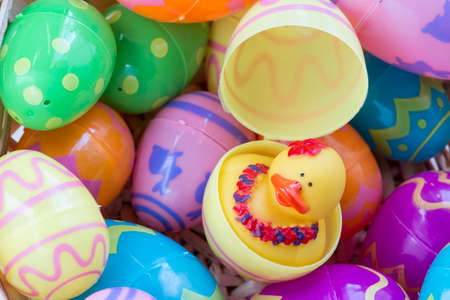 Multicolored easter egg toys with patterns, showing a hatched egg