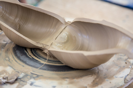 Fresh made clay jar cut in halfの写真素材