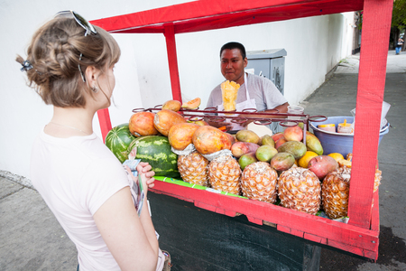 Mexico city, Mexico - march 2nd, 2012: Man selling fruit salads on street in Mexico city, Mexicoのeditorial素材