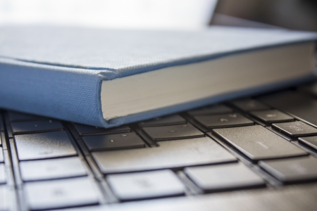 blue book with computerの写真素材