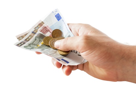 holding money in the hand, isolatedの写真素材
