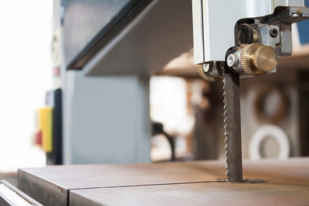 Woodworking machine  Band saw machine cutting planksの写真素材