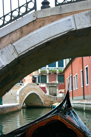 Gondola in the small canals of the romantic Veniceの写真素材