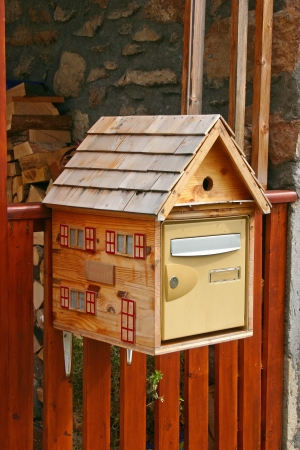 A wooden post box in the French Alpsの写真素材