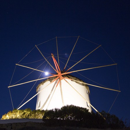 The famous wind mills in Mykoos during night timeの写真素材