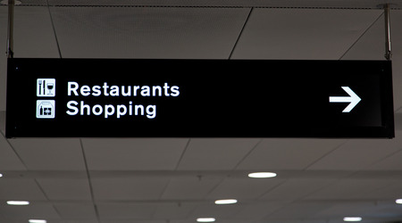 Airport info board in terminal with guiding informationの写真素材