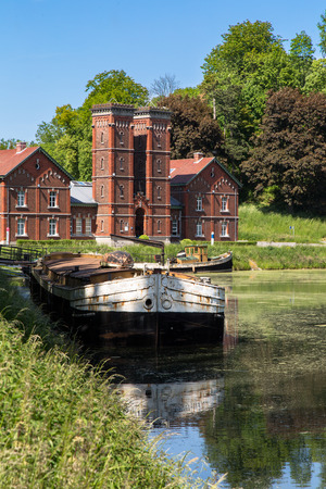 Old hydraulic boat lifts and historic Canal du Centre, Belgium, Unesco Heritage - The hydraulic lift of Strepy-Bracquegniesのeditorial素材