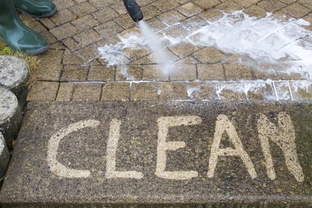 Outdoor floor cleaning with high pressure water jet