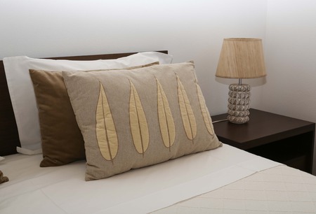 Double bed room in a hotel roomの写真素材