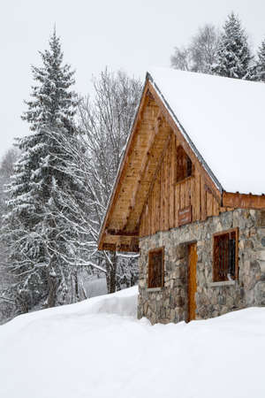 Chalet covered with snow in the French Alpsのeditorial素材