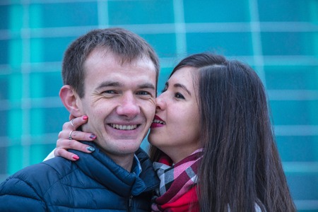 Young girl kiss the boy at outdoorsの写真素材