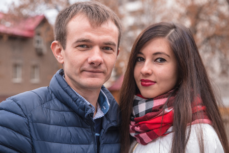 girl and boy stay together outdoorsの写真素材