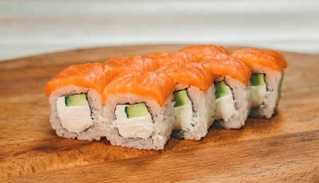 tasty sushi set on a wooden trayの写真素材