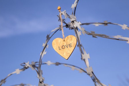 wooden hearts on the prison wallの写真素材