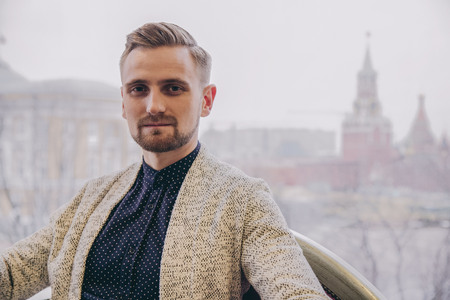 fashion dressed man walk on the streetの写真素材