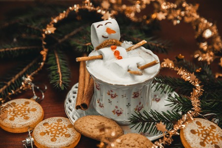 christmas marshmallow man in a cup of coffeeの写真素材