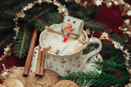 christmas marshmallow man in a cup of coffeeの写真素材
