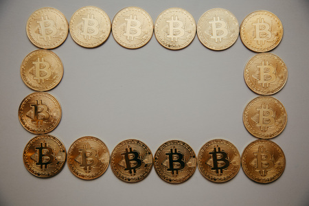 frame of bitcoins in the form of a circle, square and heartの写真素材