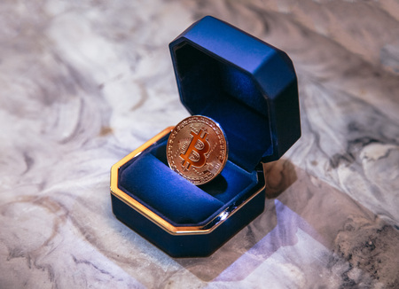 bitcoin inside the box for the ringの写真素材