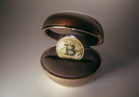 bitcoin inside the box for the ringの写真素材