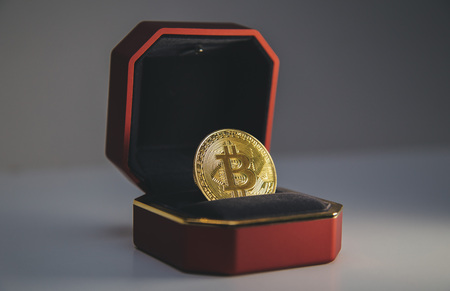 bitcoin inside the box for the ringの写真素材