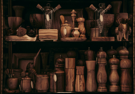 wooden utensils, saltcellars and items on shelves