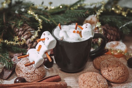 Christmas happy marshmallow man in a cup of coffeeの写真素材