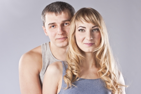 Portrait of a happy young couple  Studioの写真素材