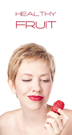 Vegetarian food. Girl with strawberries isolated on whiteの写真素材
