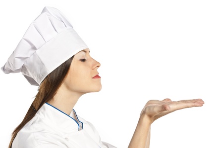 Cook or chef showing and presenting. Woman chef isolated on white backgroundの写真素材