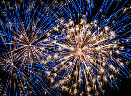 Fireworks light up the night sky for a celebrationの写真素材