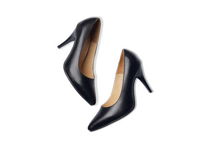 Top view. Black Leather high heels shoes on white backgroundの写真素材