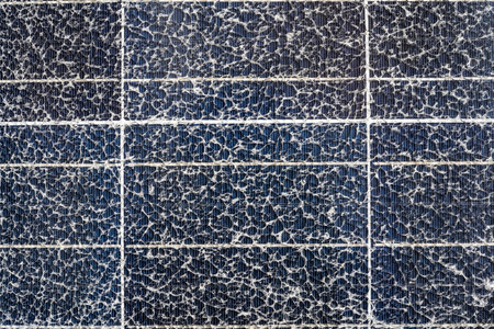 Close-up shot of  broken solar panel , Damaged and cracked solar panel with fractured glass.