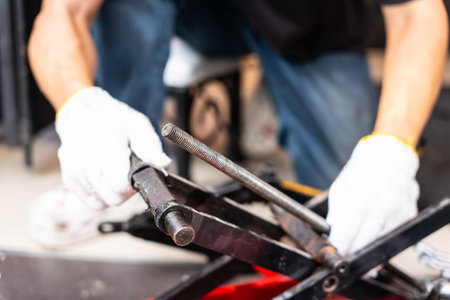The scissor jack threads were broken, repair garage lift tables