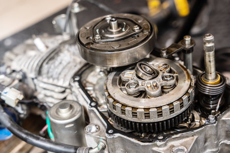 Close-up of different components of old Motorcycle clutch ,Alternating layers of fiber friction disc...