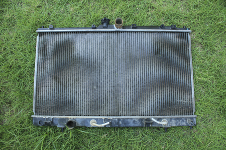 Engine cooling radiator on the grass, the old versionの写真素材