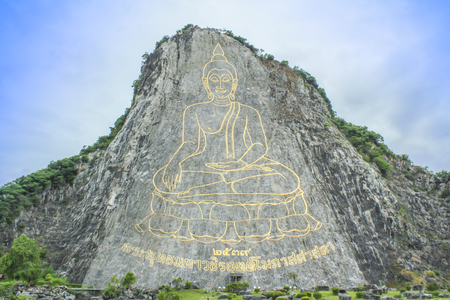 Golden Buddha laser carved and inlayed with gold on Khao Chi Chan Cliff, Pattaya, Chonburi, Thailand,Buddha Mountainの写真素材