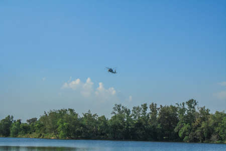 Rayong/Thailand- âNovember â21, â2018: Sikorsky S-70B-7 Seahawk Royal Thai Navy over the tree at U-Tapao Rayong International Airport, Rayong,Thailandのeditorial素材