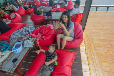 Sky view cafe, Chanthaburi, Thailand. May 31, 2020 : Bright atmosphere, Tourists sitting happily at viewpoint of sky view cafe, Pha Sukniran View Point, Chanthaburiのeditorial素材