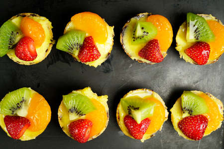 Fresh delicious  fruit tart on top view.の写真素材