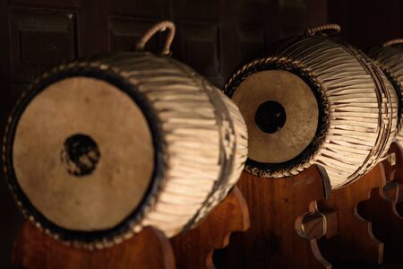 Southeast Asian musical instruments are housed in a wooden house.の写真素材
