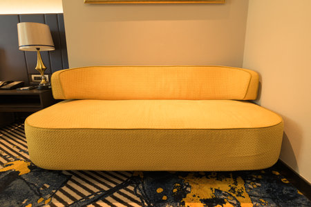 Living room with yellow sofa and lamp