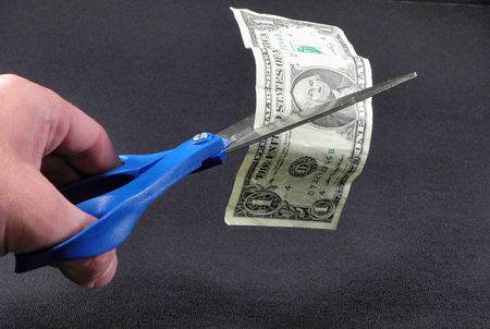 Cutting money with Scissors