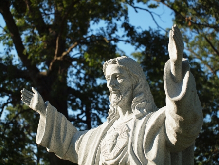 Jesus Christ Lifting Hands in Blessing with Sacred Burning Heartの写真素材